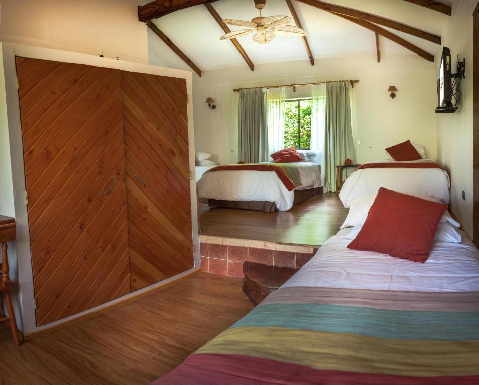 Postel nebo postele na pokoji v ubytování Pikera Uri Eco Lodge
