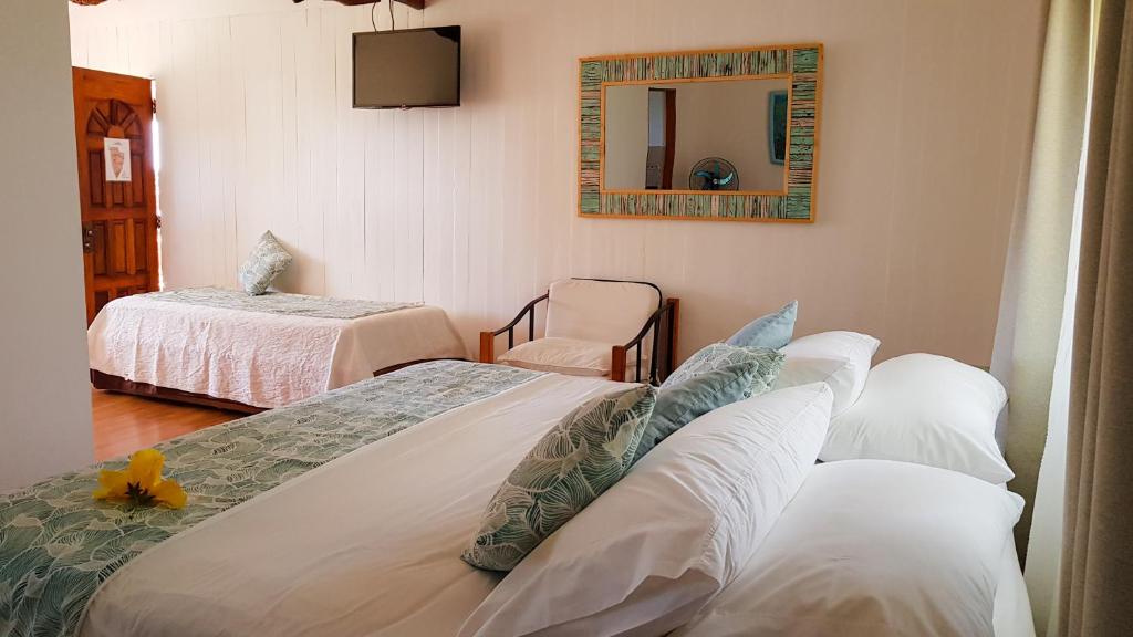 Postel nebo postele na pokoji v ubytování Pikera Uri Eco Lodge
