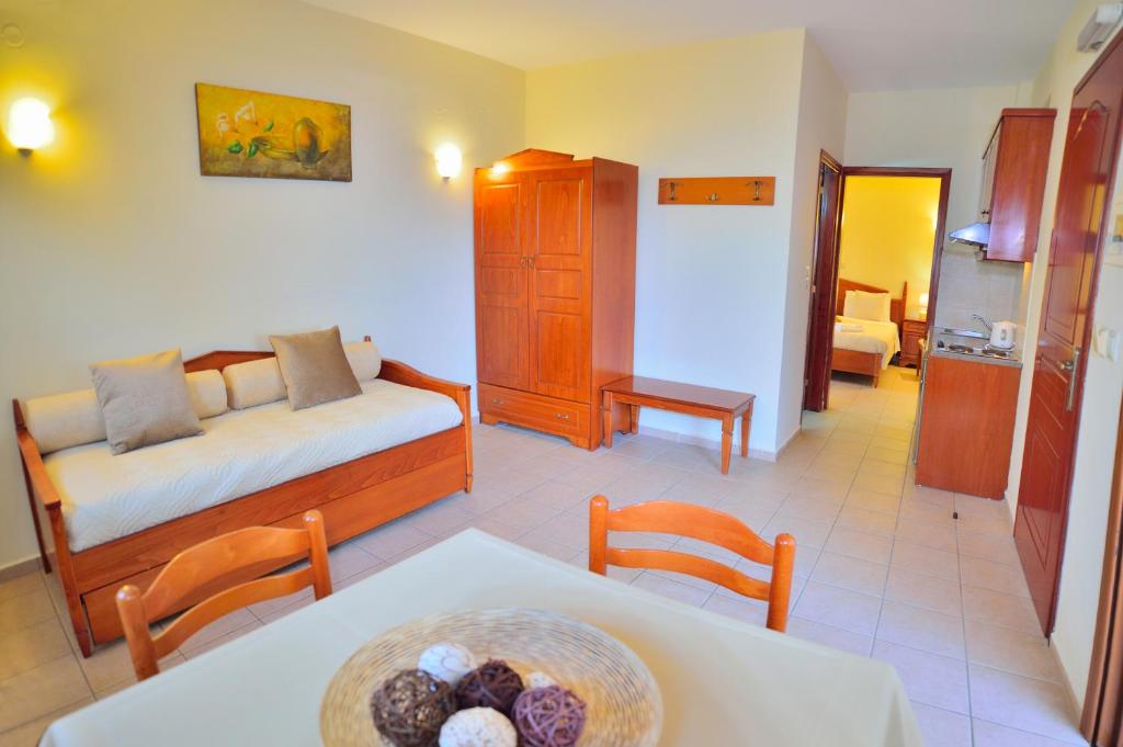 מיטה או מיטות בחדר ב-Maria Beach Hotel