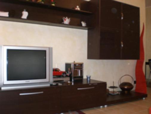 A kitchen or kitchenette at Le Sorelle