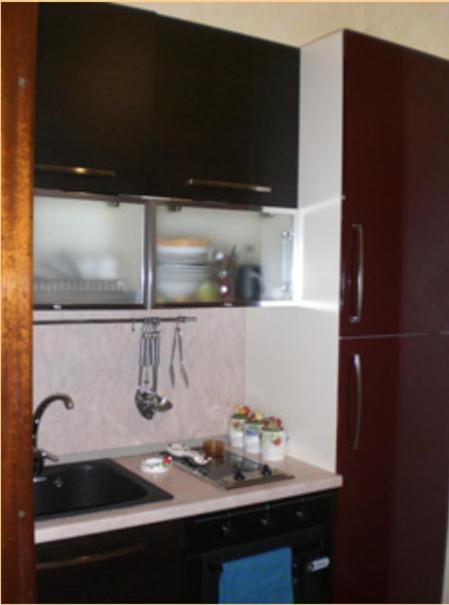 A kitchen or kitchenette at Le Sorelle