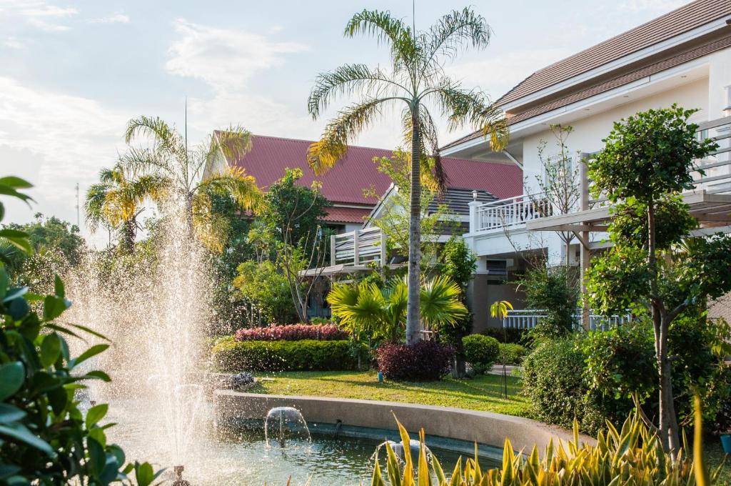 a fountain in front of a building at Tonwa Resort Hotel in Khon Kaen