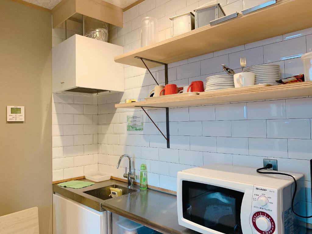 Kuchyň nebo kuchyňský kout v ubytování Good Diner Inn Copain