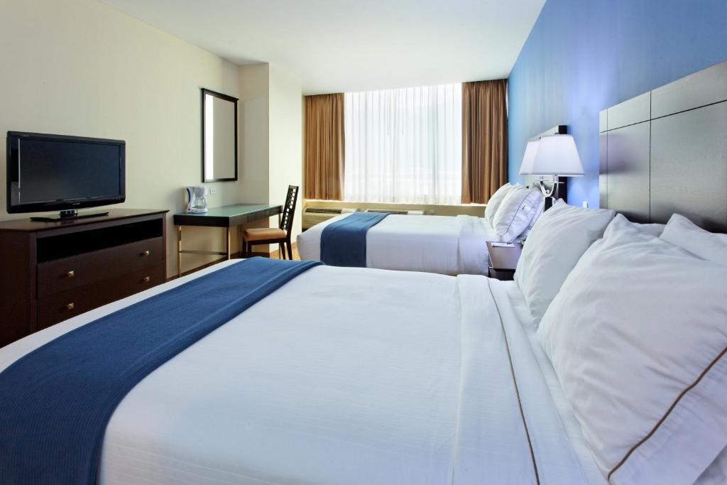 Postel nebo postele na pokoji v ubytování Intercity Hotels San Pedro Sula