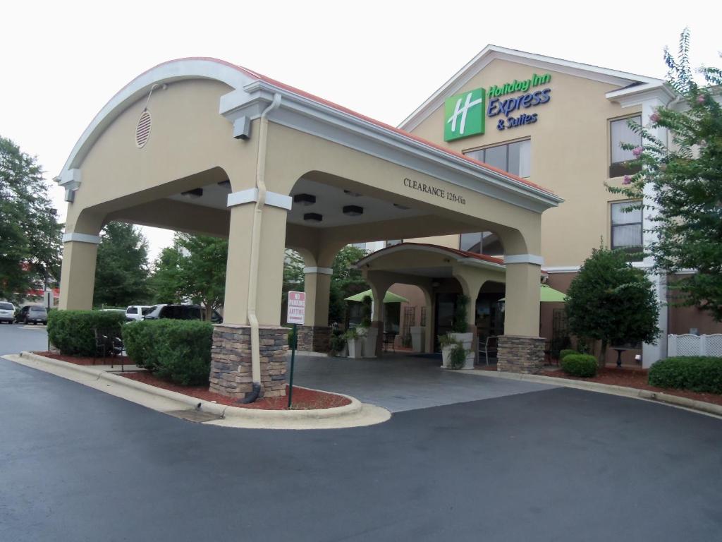 a building with an entrance to a shopping center at Holiday Inn Express Hotel & Suites Sanford, an IHG Hotel in Sanford