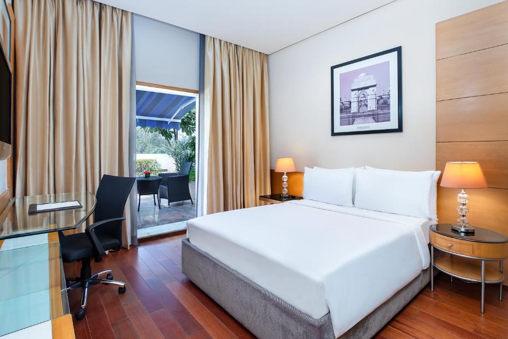 Postel nebo postele na pokoji v ubytování Radisson Blu Marina Hotel Connaught Place