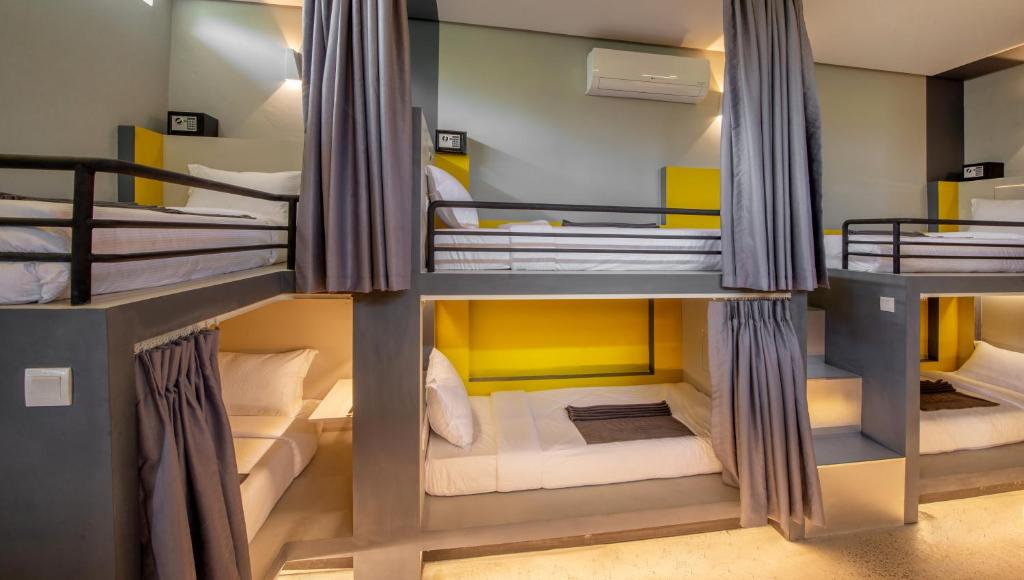 Postel nebo postele na pokoji v ubytování The Twizt - Lifestyle Hostel & Hotel
