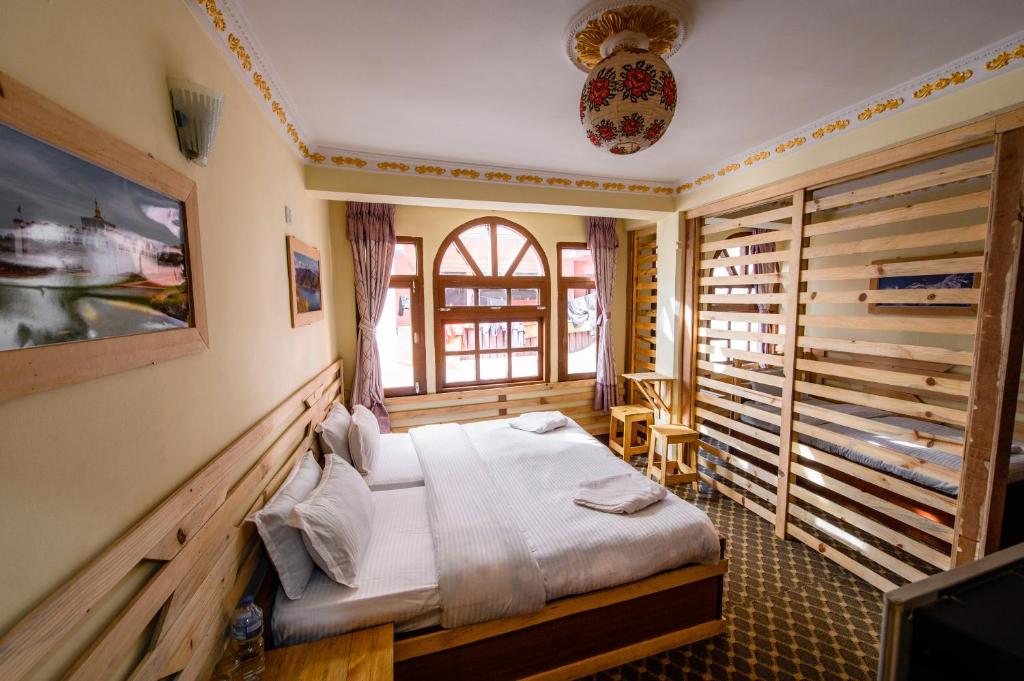 Postel nebo postele na pokoji v ubytování Hotel Pomelo House