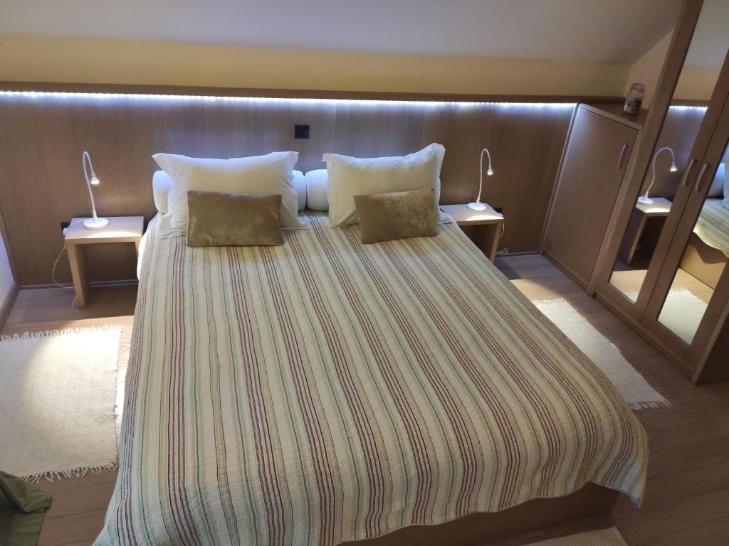 Postel nebo postele na pokoji v ubytování House Biba & Leona