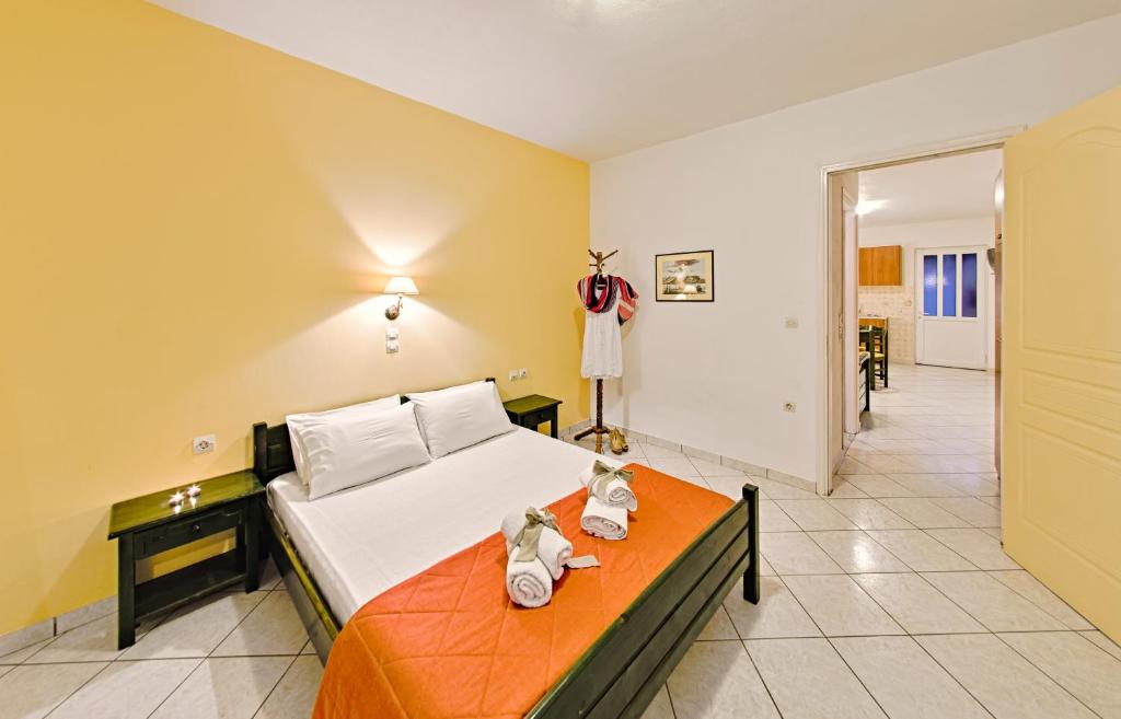 Postel nebo postele na pokoji v ubytování Remezzo Studios & Apartments