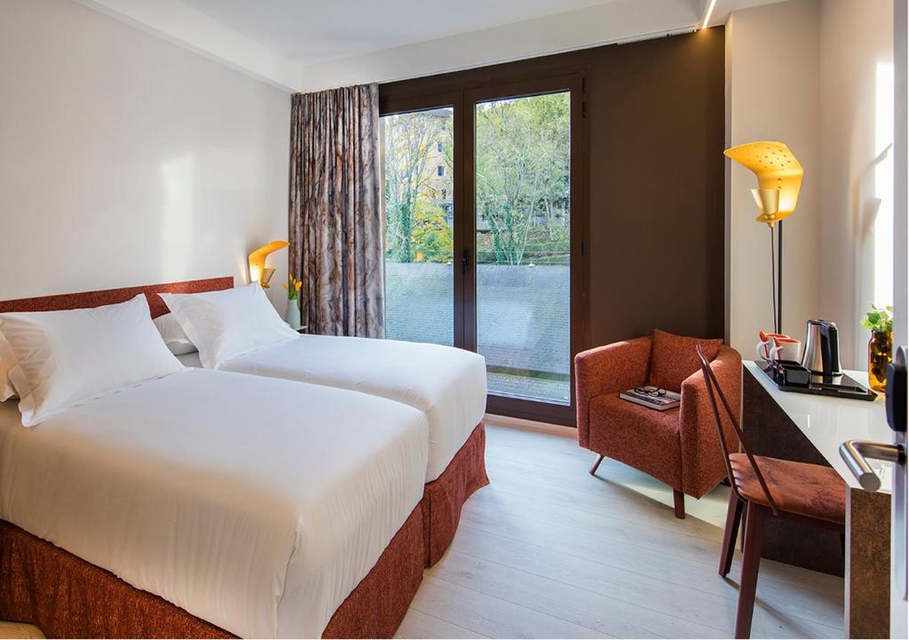 Posteľ alebo postele v izbe v ubytovaní Axel Hotel San Sebastián - Adults Only