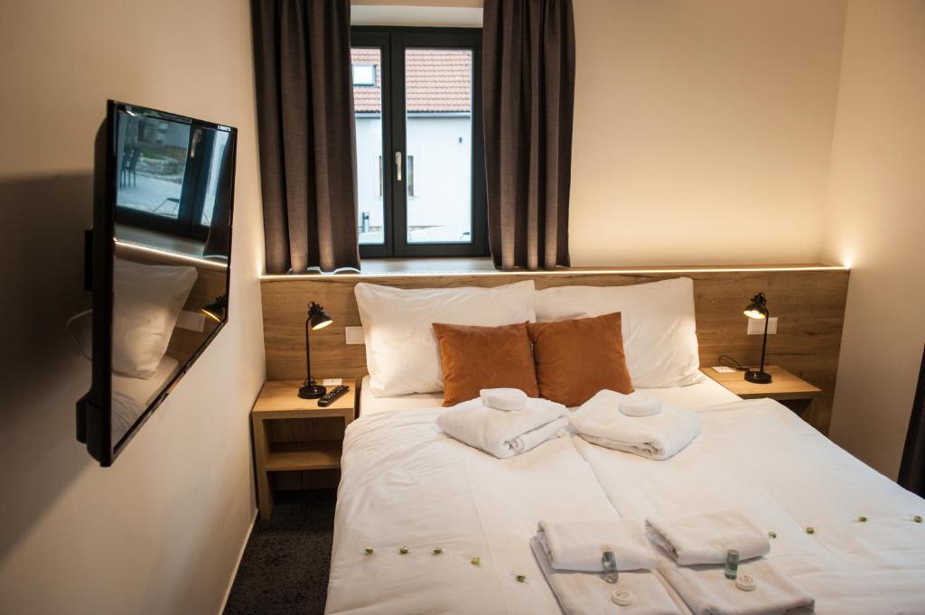 Ein Bett oder Betten in einem Zimmer der Unterkunft Resort Orsino