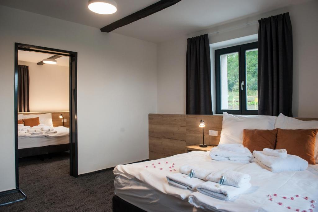 Ein Bett oder Betten in einem Zimmer der Unterkunft Resort Orsino