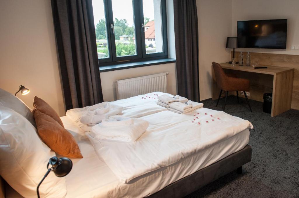 Ein Bett oder Betten in einem Zimmer der Unterkunft Resort Orsino