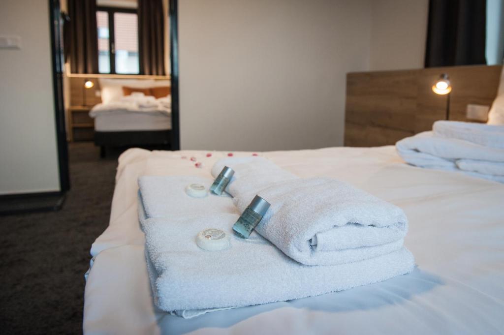 Ein Bett oder Betten in einem Zimmer der Unterkunft Resort Orsino