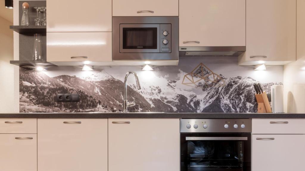 Kuchyň nebo kuchyňský kout v ubytování Mountain Apart Oetztal