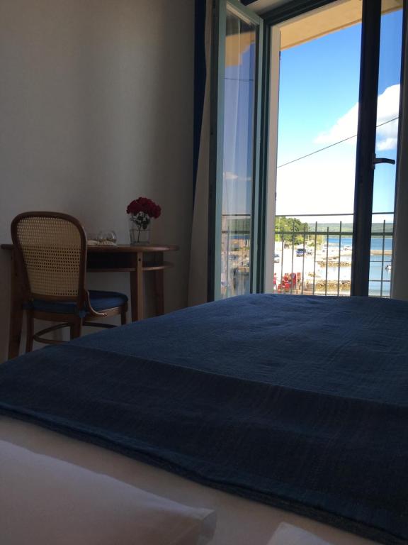 Postel nebo postele na pokoji v ubytování Hotel Televrin
