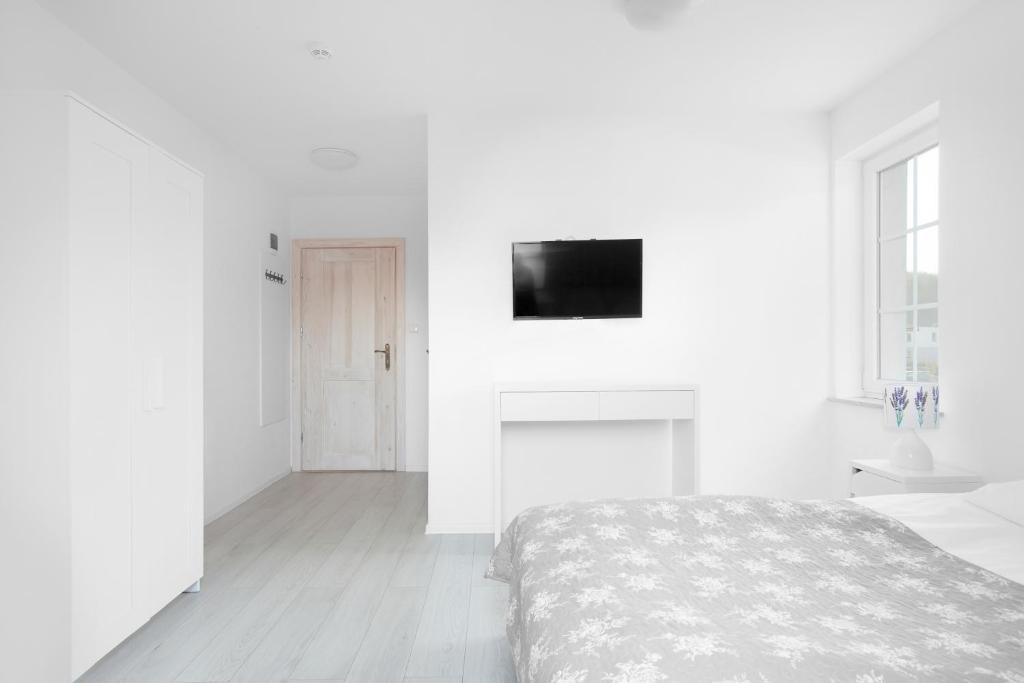 Postel nebo postele na pokoji v ubytování Apartamenty Góra