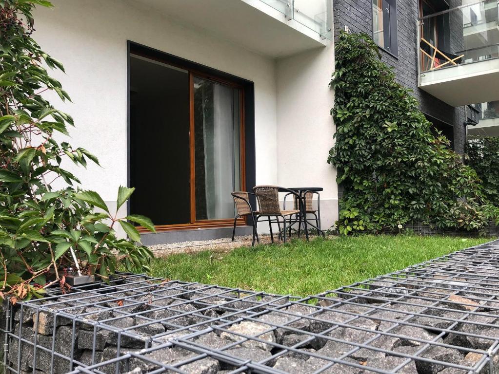 Vonkajšia záhrada v ubytovaní Apartments Nearto Old Town Rakowicka