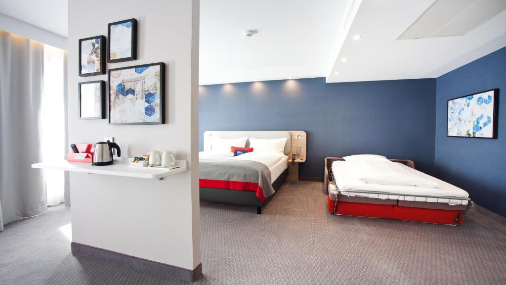 Postel nebo postele na pokoji v ubytování Holiday Inn Express - Saarbrücken by IHG