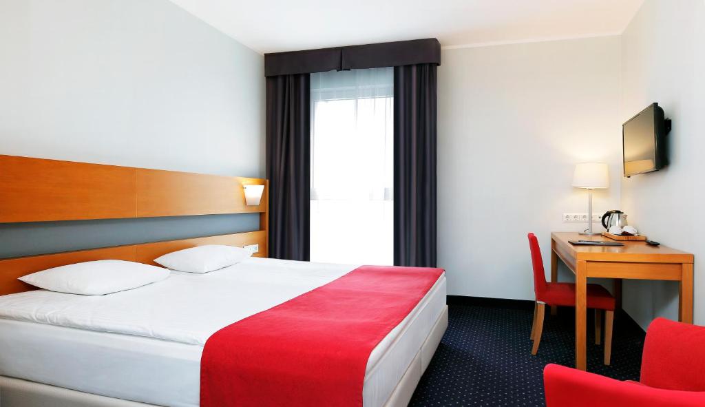 Voodi või voodid majutusasutuse Hestia Hotel Ilmarine toas