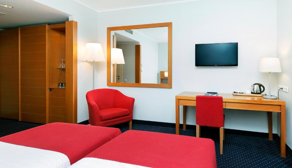 Televiisor ja/või meelelahutuskeskus majutusasutuses Hestia Hotel Ilmarine