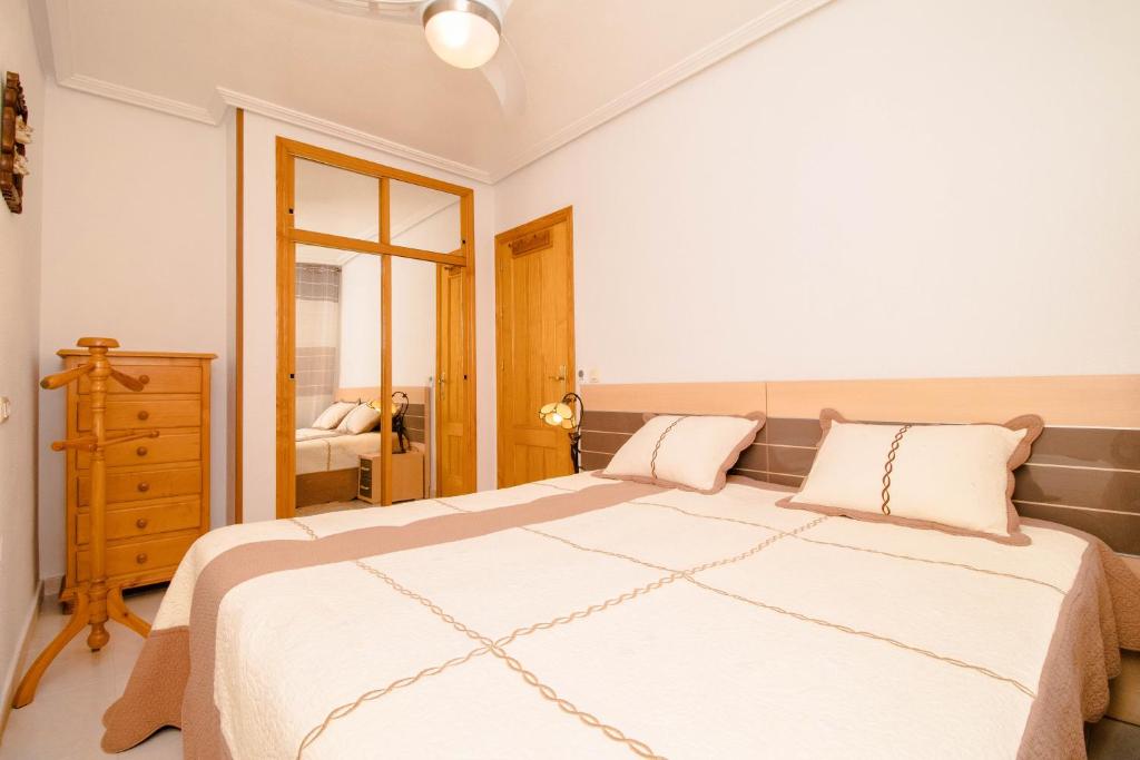 Postel nebo postele na pokoji v ubytování Espanatour GALEON