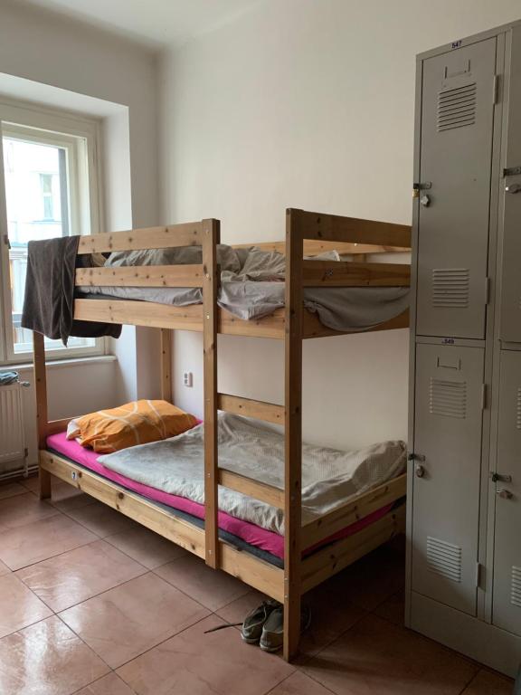 Postel nebo postele na pokoji v ubytování Hostel Fontana
