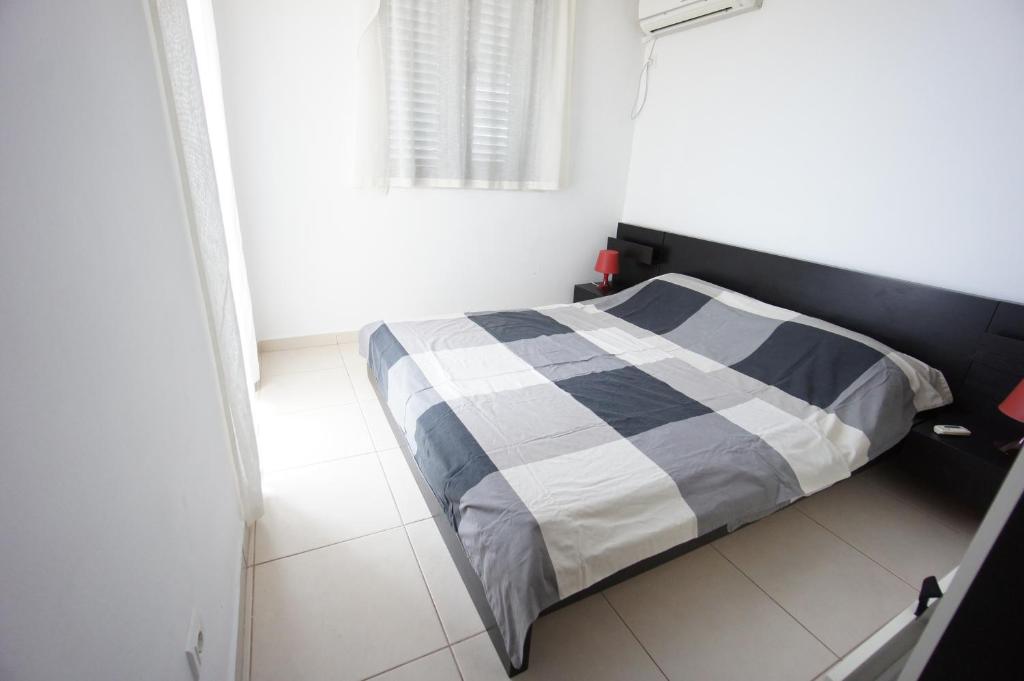 Postel nebo postele na pokoji v ubytování Apartments Bečići Sunset
