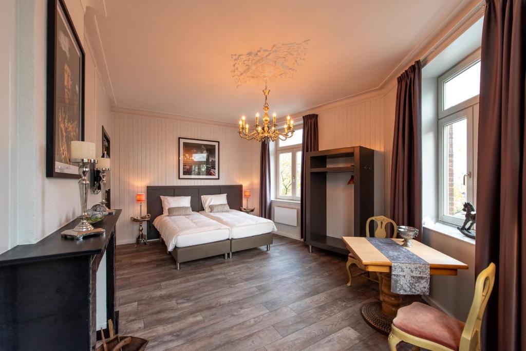 Llit o llits en una habitació de BnB prins Hendrik Venlo