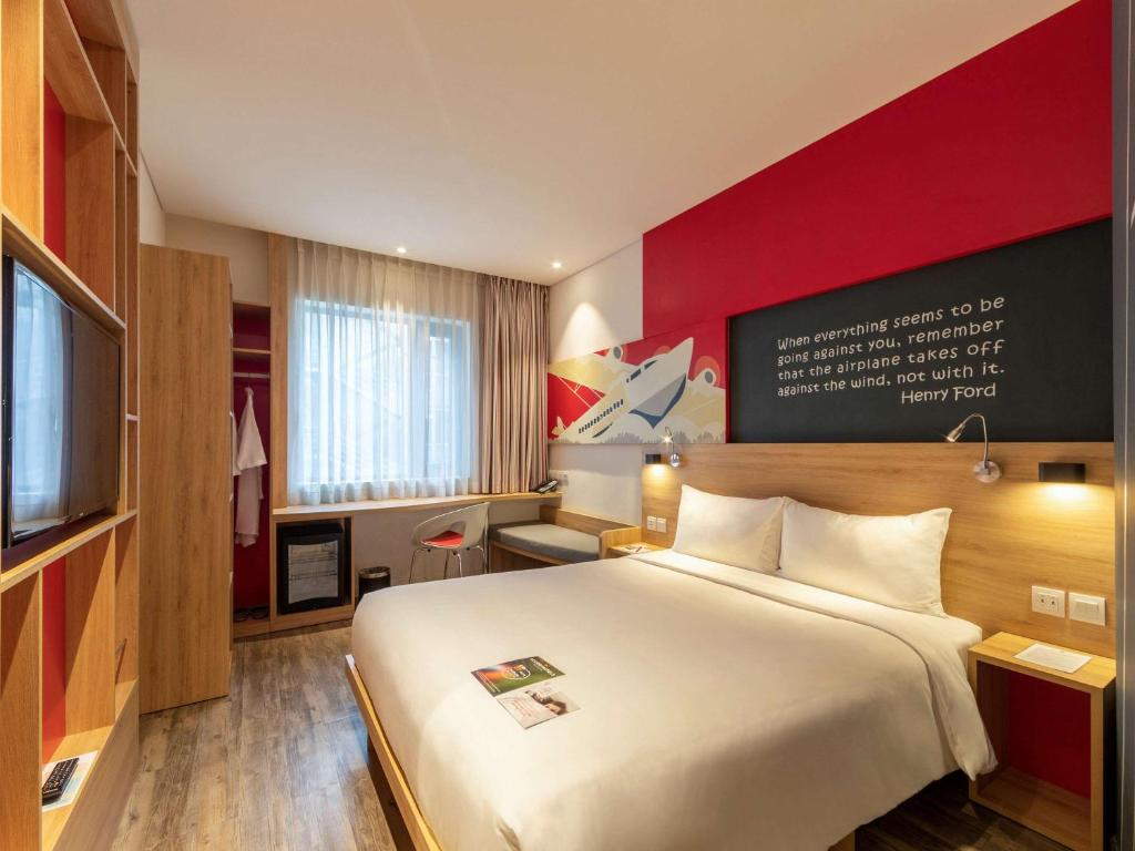 Postel nebo postele na pokoji v ubytování Ibis Saigon Airport