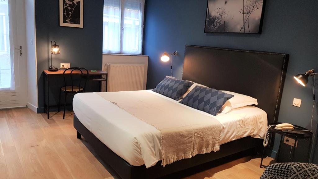 Postel nebo postele na pokoji v ubytování Le Beaugency