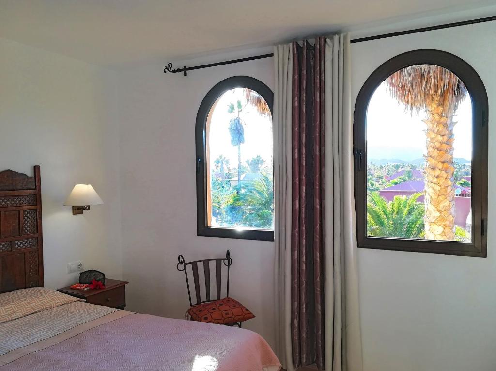 Postel nebo postele na pokoji v ubytování Apartment Gardenia, Oasis Tamarindo