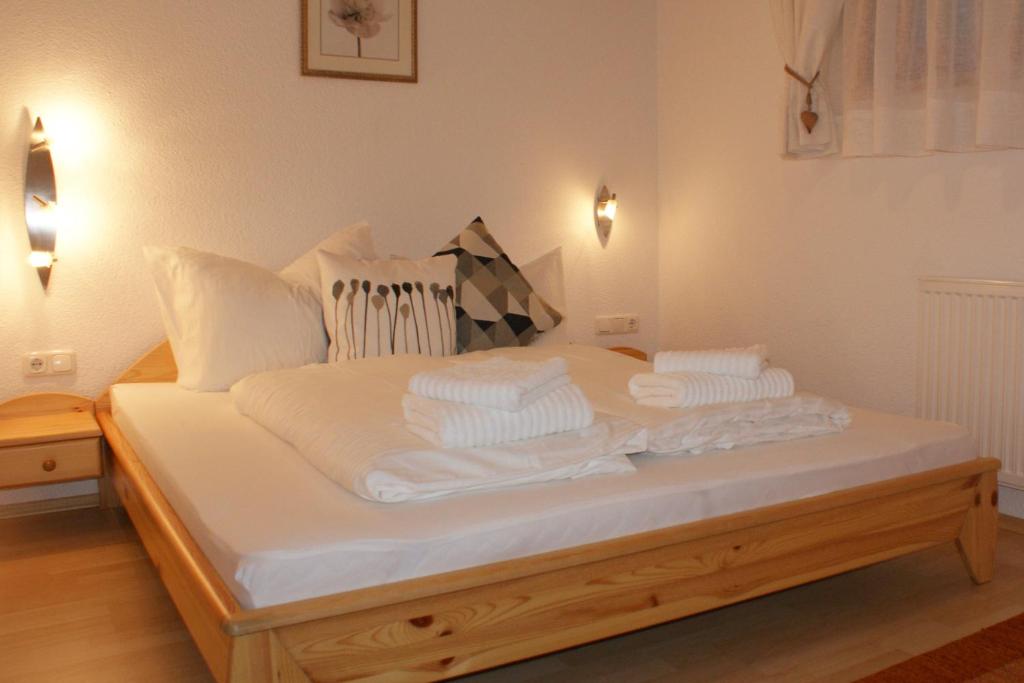 Postel nebo postele na pokoji v ubytování Haus am Stein