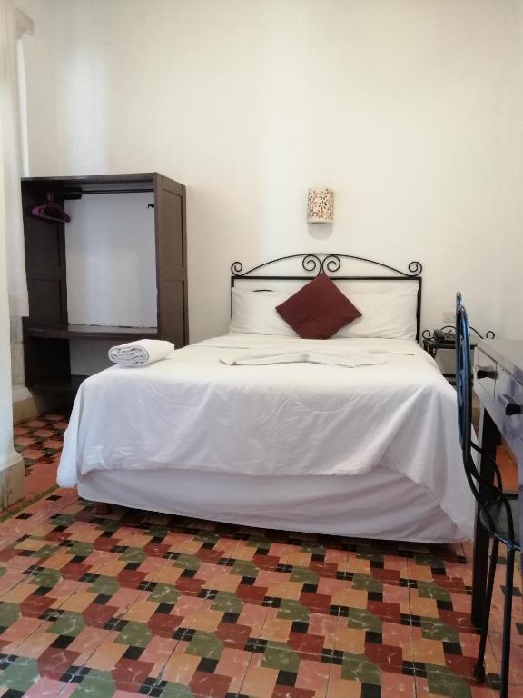 Postel nebo postele na pokoji v ubytování Hotel Reforma