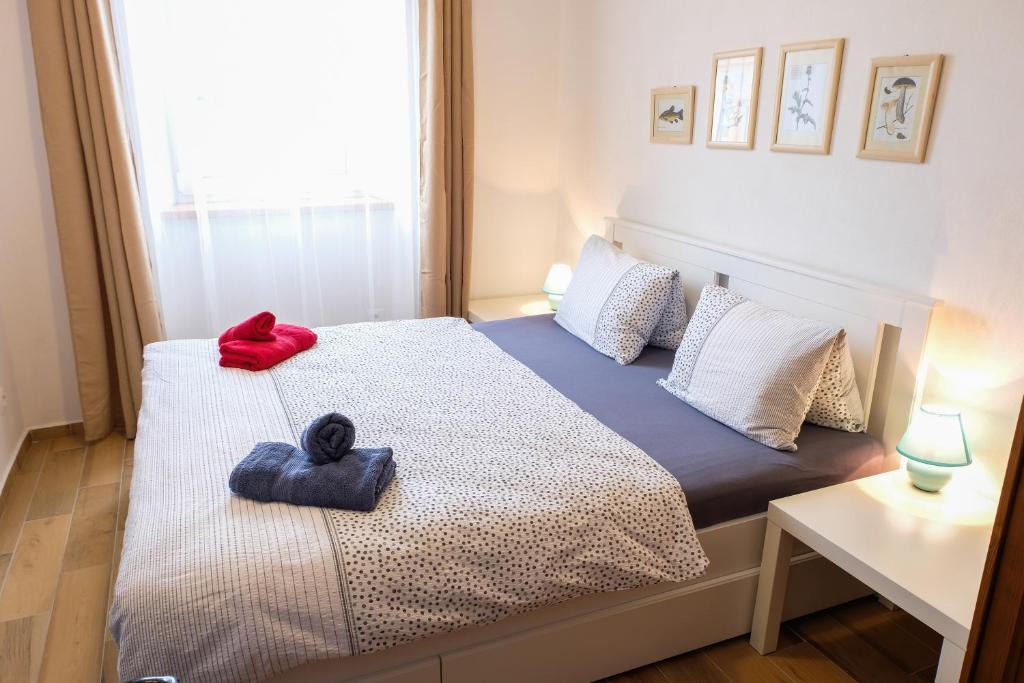 Postel nebo postele na pokoji v ubytování Škorničkův statek
