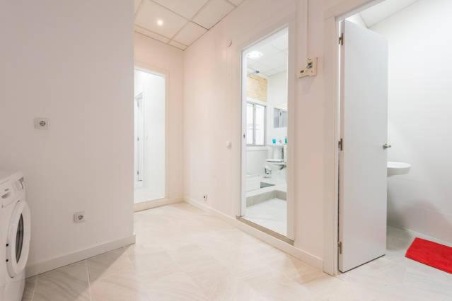 Koupelna v ubytování M&F Apartaments Gran Via