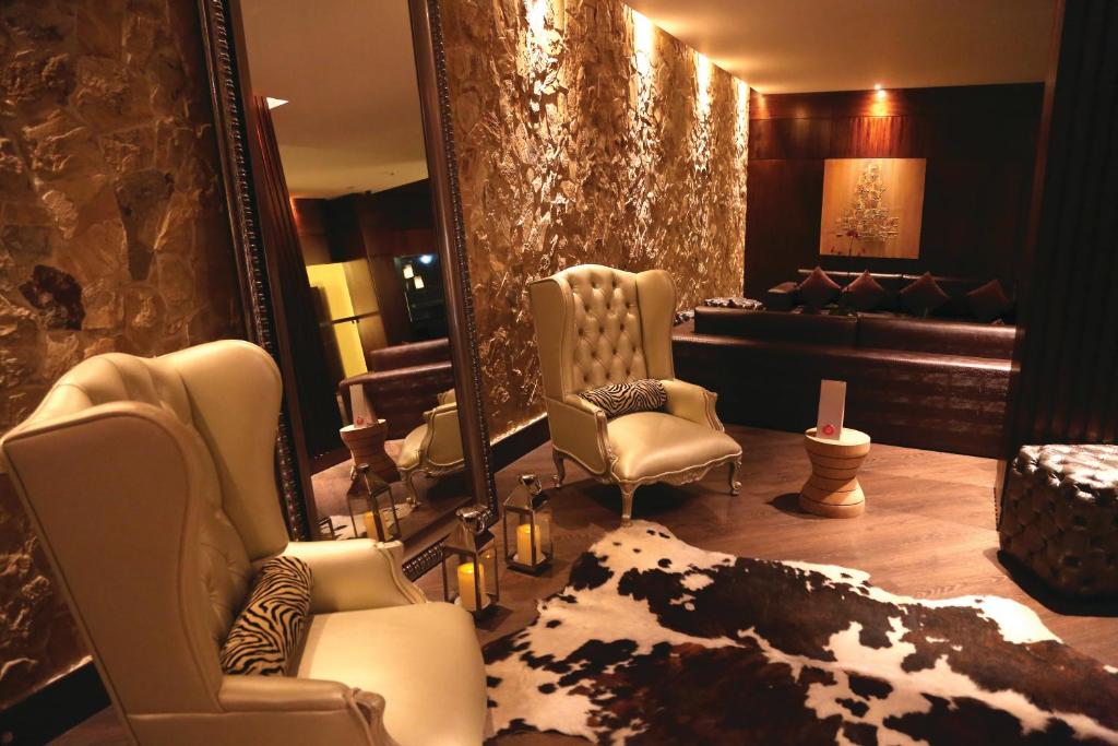 Posezení v ubytování Hotel Reina Isabel