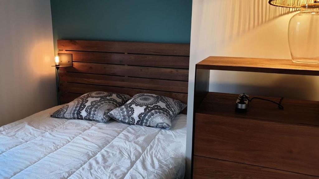 Postel nebo postele na pokoji v ubytování Rélocation vacances de la cote sauvage