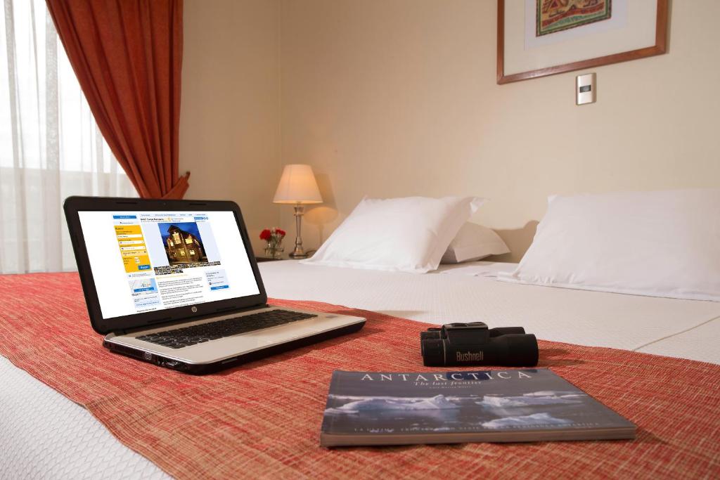 Postel nebo postele na pokoji v ubytování Hotel Carpa Manzano