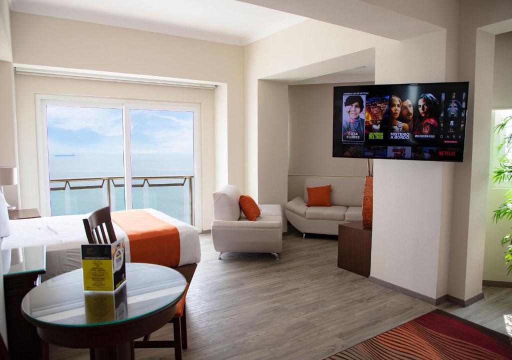 TV a/nebo společenská místnost v ubytování Hotel Lois Veracruz