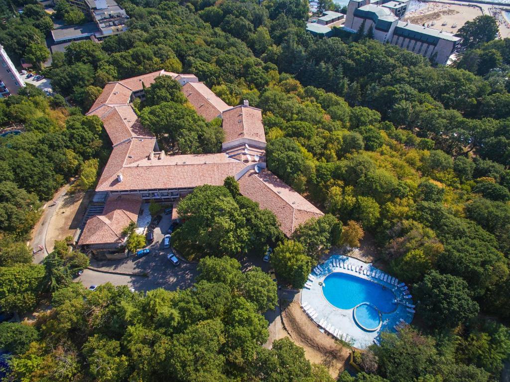 an aerial view of a house with a swimming pool at Hotel PRESLAV in Golden Sands