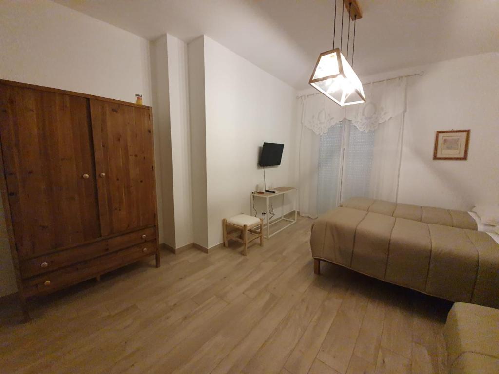 TV a/nebo společenská místnost v ubytování B&B Locanda Criloro
