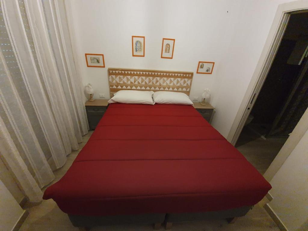 Postel nebo postele na pokoji v ubytování B&B Locanda Criloro