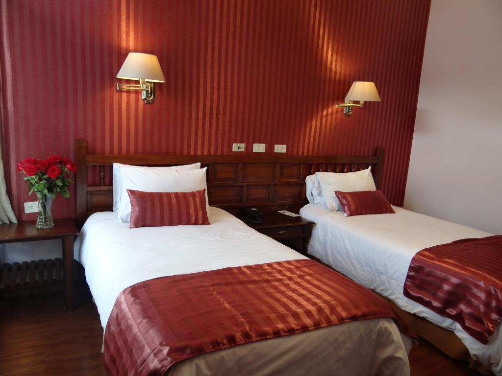 Postel nebo postele na pokoji v ubytování Hotel Real Audiencia