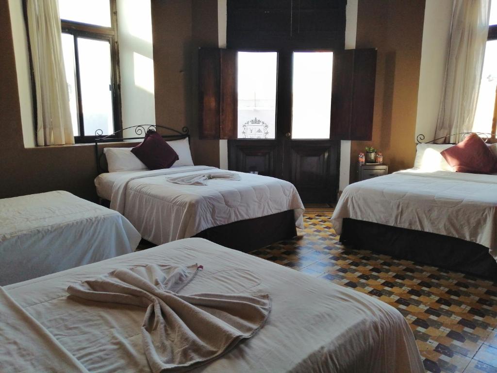 Postel nebo postele na pokoji v ubytování Hotel Reforma