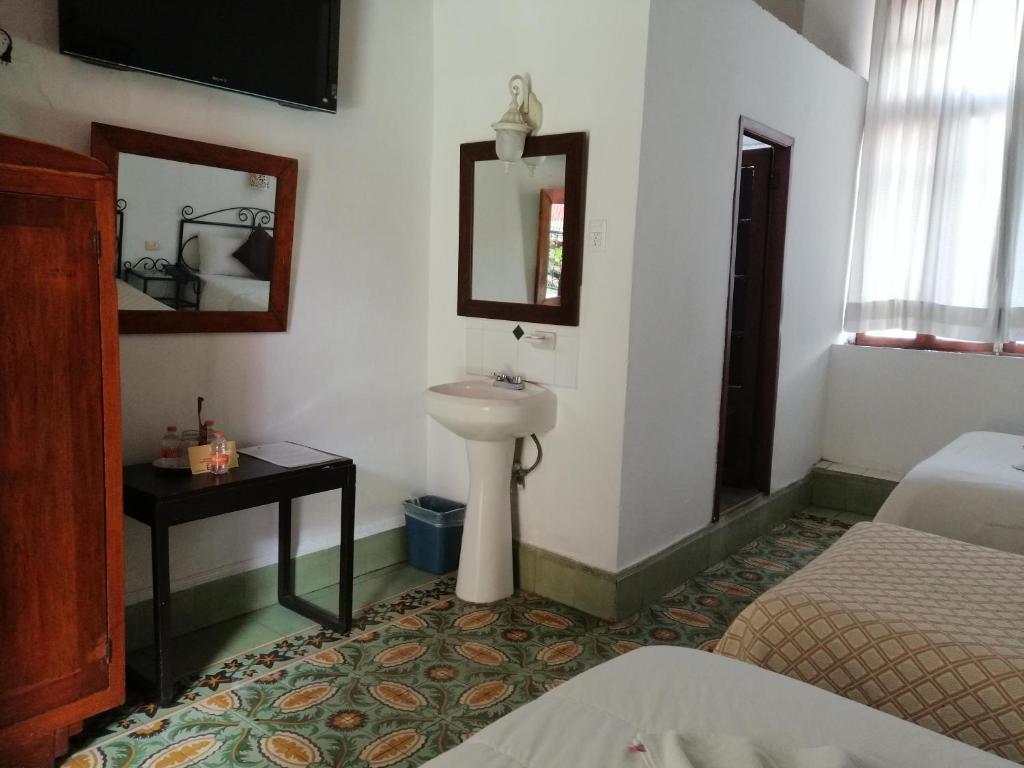 Postel nebo postele na pokoji v ubytování Hotel Reforma