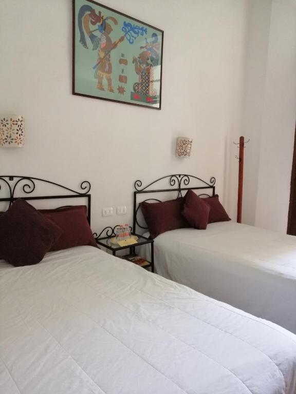 Postel nebo postele na pokoji v ubytování Hotel Reforma