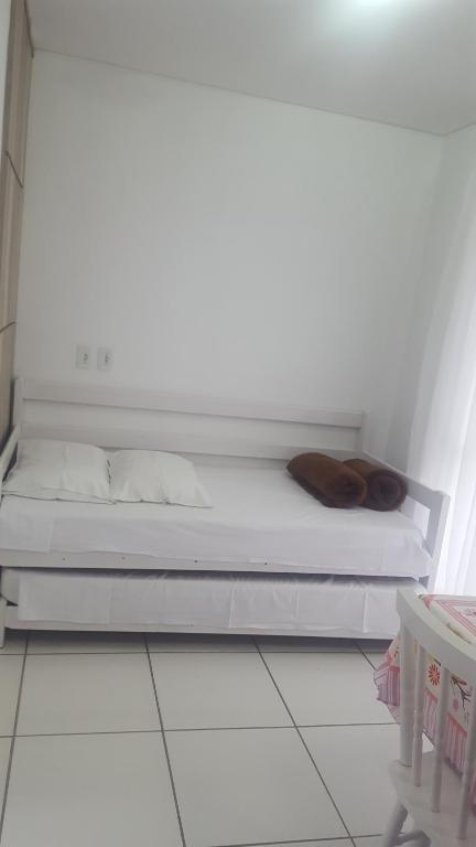 Postel nebo postele na pokoji v ubytování Residencial Neto