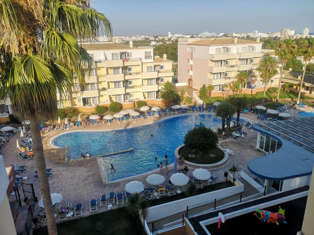 an overhead view of a swimming pool in a resort at Waves Alvor in Portimão